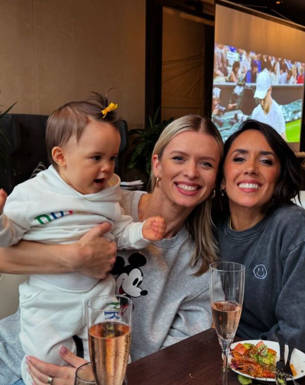 A young girl with Nadiya Bychkova and Janette Manrara