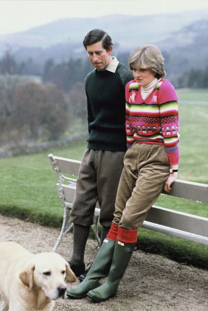 King Charles and Princess Diana wearing an Inca jersey jumper with green corduroy trousers and Hunter wellies