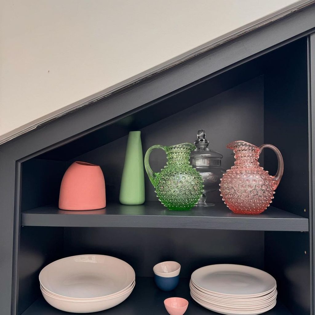 Nigella shared a 'shelfie' from her London home showing off jugs and crockery on a grey shelf unit