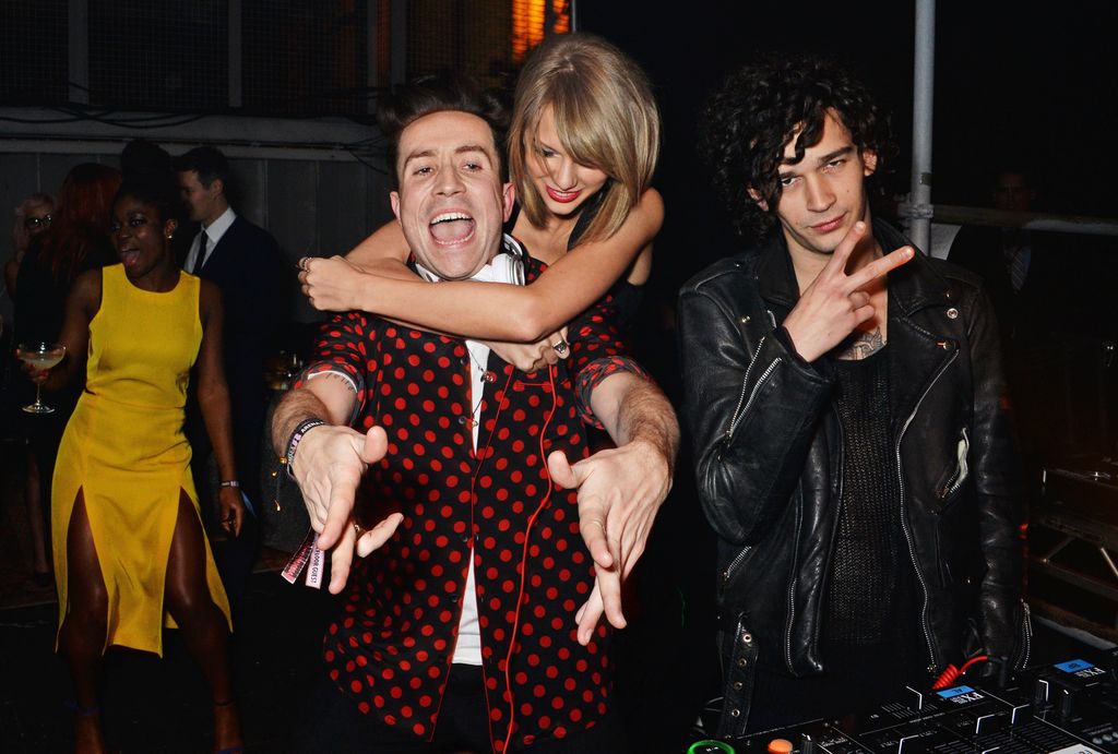  Nick Grimshaw, Taylor Swift and Matt Healy attends the Universal Music Brits party hosted by Bacardi at The Soho House Pop-Up on February 25, 2015