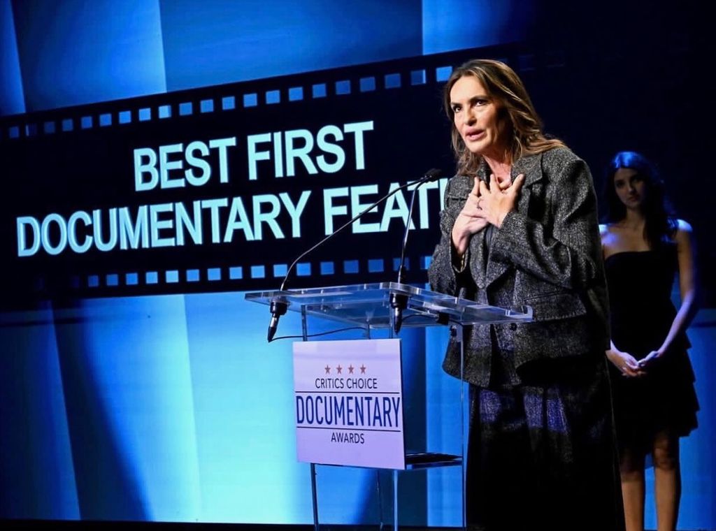 photo of mariska hargitay on stage collecting best first documentary feature awards