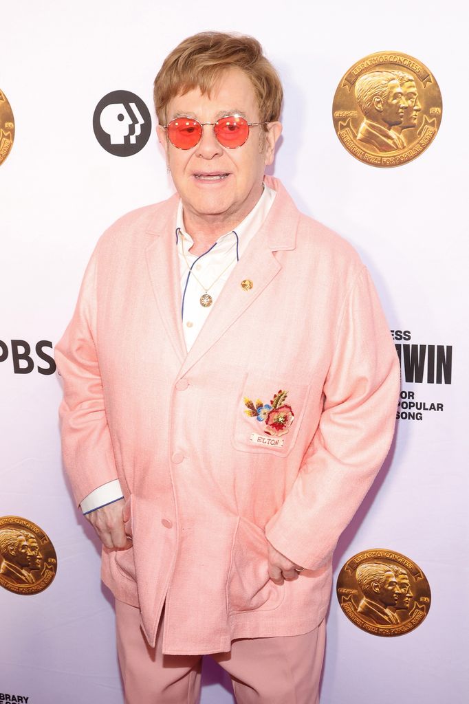 elton john pink suit 