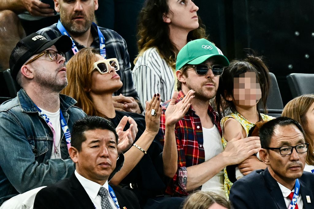 Eva Mendes and Ryan Gosling attend the artistic gymnastics women's uneven bars final during the Paris 2024 Olympic Games at the Bercy Arena in Paris, on August 4, 2024