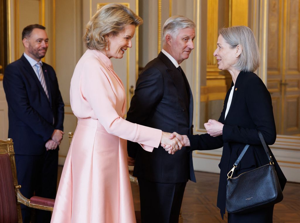 Belgian Foreign Minister Maxime Prevot, Queen Mathilde of Belgium, King Philippe of Belgium and Danish Ambassador to Belgium Susanne Shine attend a reception for the heads of diplomatic missions accredited to Belgium and their spouses, at the Belgian Royal Palace, in Brussels, on January 8, 2026