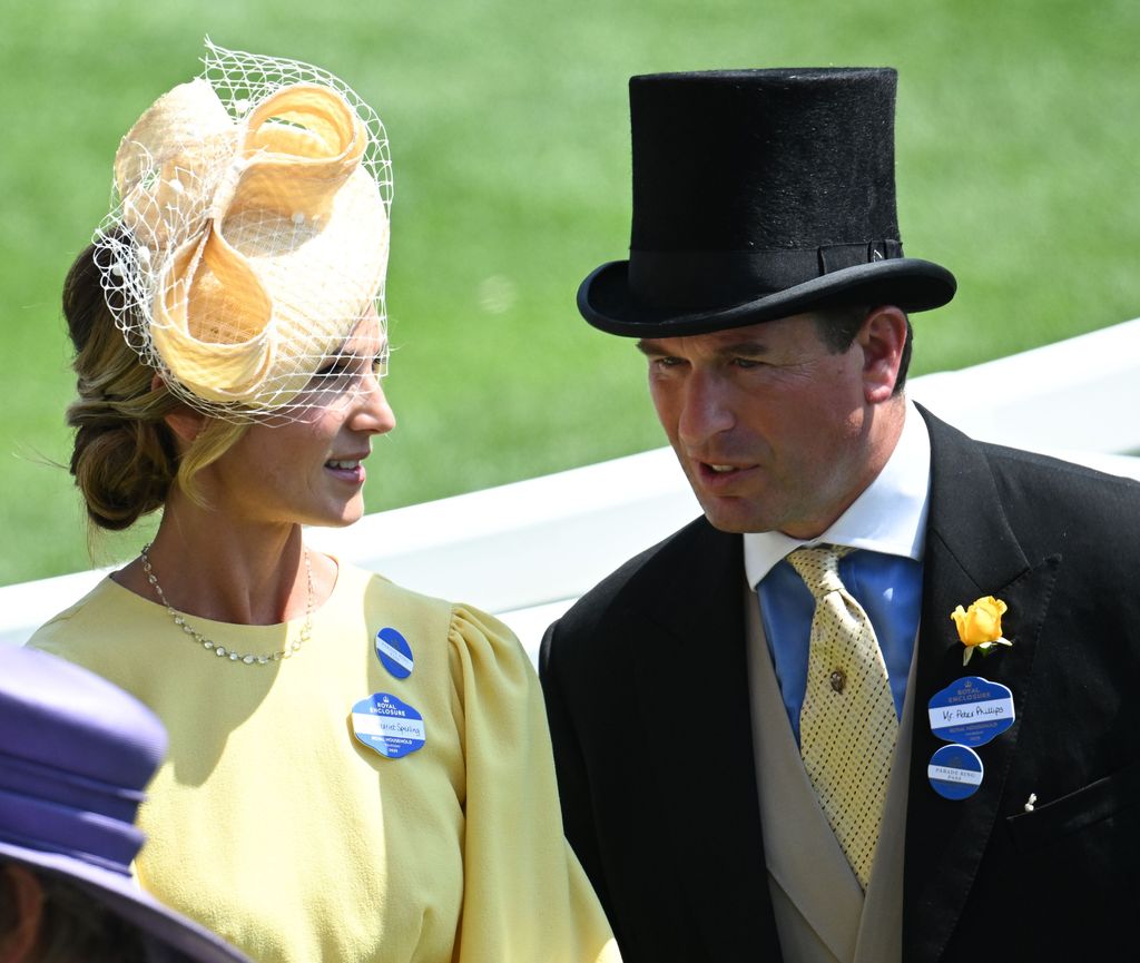 Harriet Sperling in a yellow dress looking at Peter Phillips at Ascot