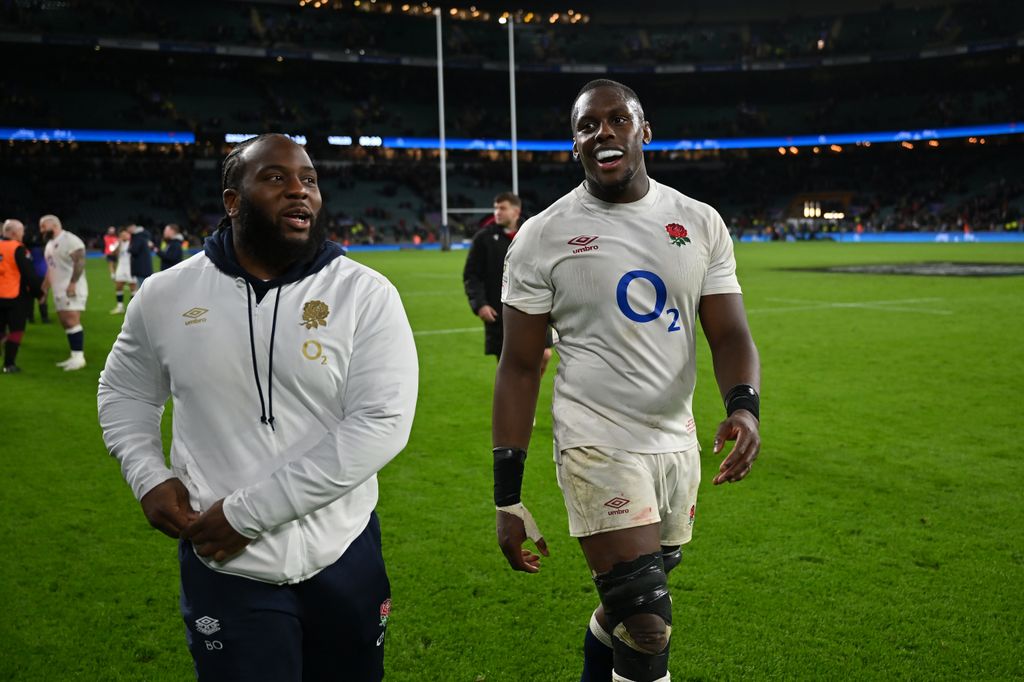 Beno Obano and Maro Itoje walking off a pitch