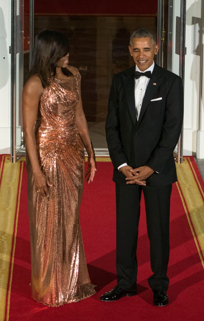 Michelle Obama wearing an Atelier Versace dress to a State dinner in 2016