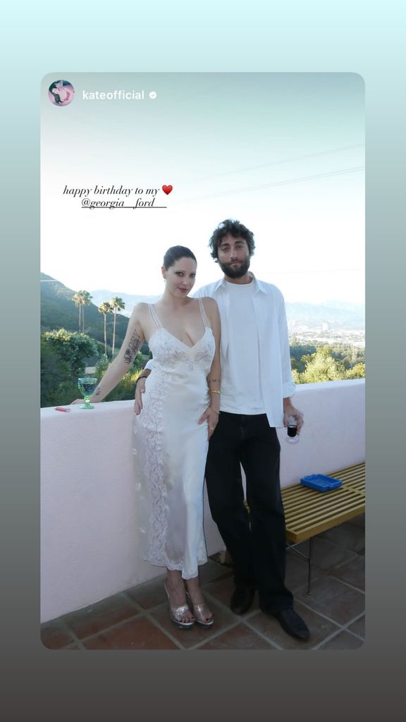 A photo of Georgia Ford and a friend on a balcony shared on Instagram Stories on her birthday
