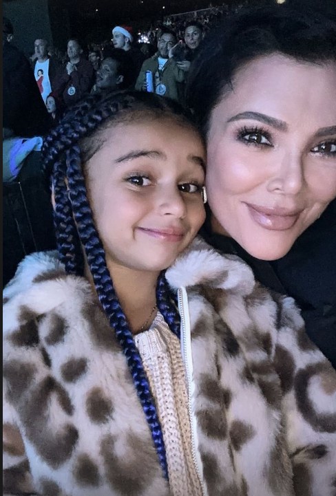 Dream Kardashian posing with Kris Jenner