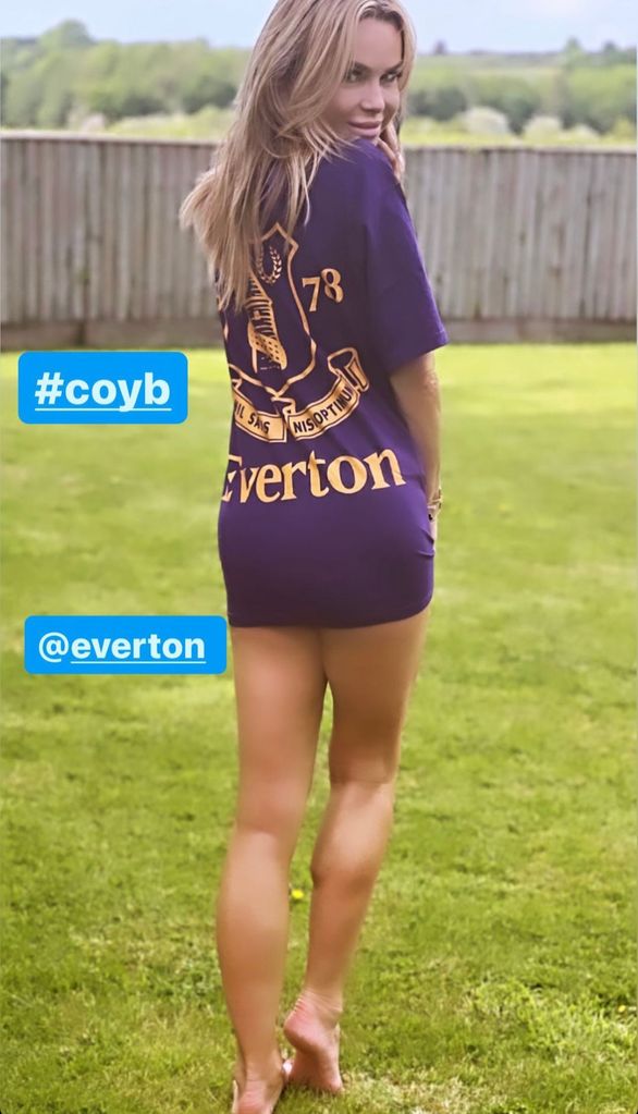 Amanda Holden poses in racy thigh-skimming football shirt dress after