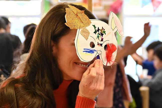 Princess of Wales decorates a face mask