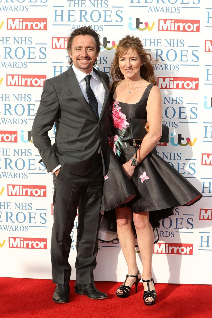 couple posing on red carpet