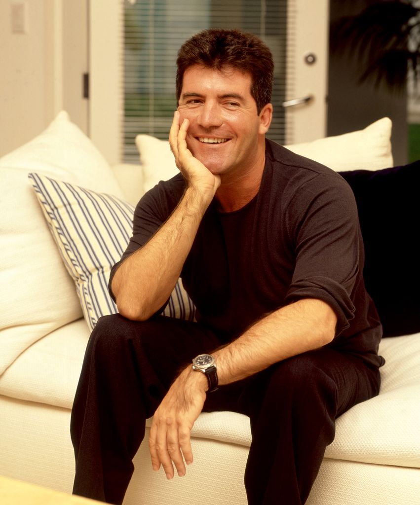  Simon Cowell in black top and pants poses for a portrait circa 2002 in Los Angeles, California