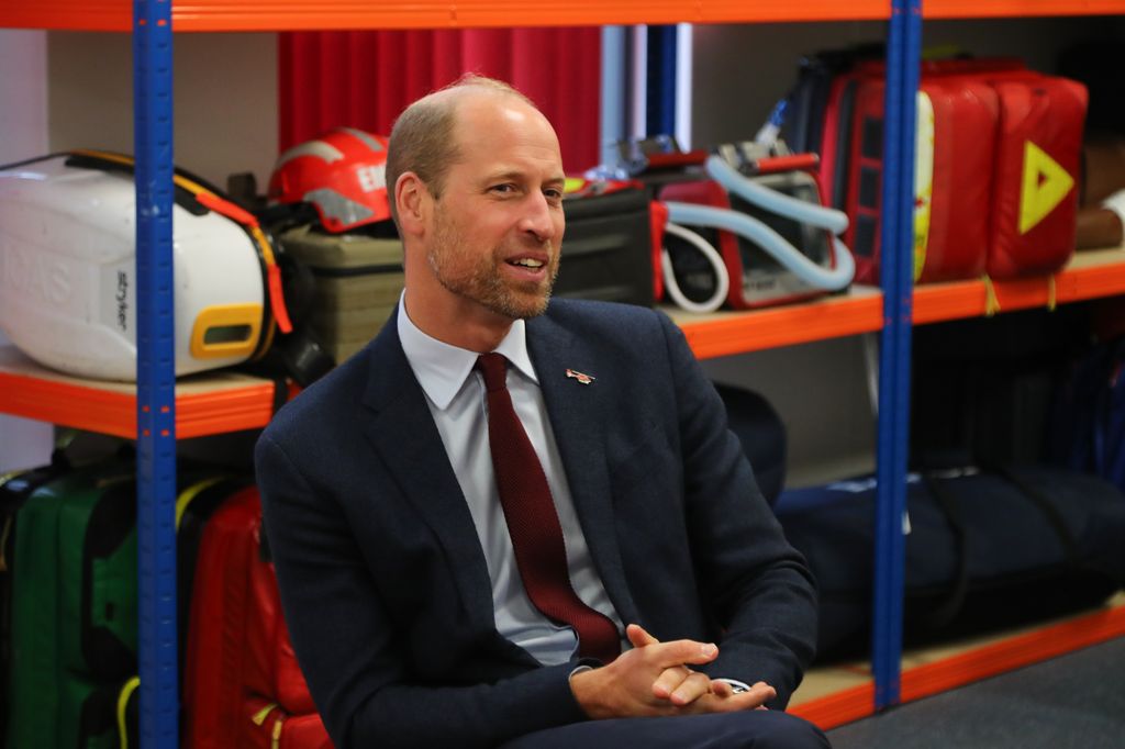 Prince William meets with staff and crew members as he visits the Wales Air Ambulance