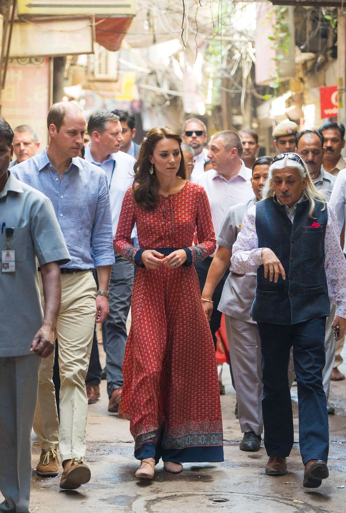 Kate Middleton walking through New Delhi in red maxi dress