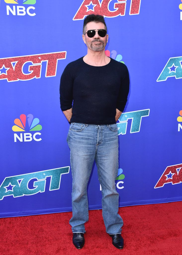 simon cowell in long sleeved top with short hair and sunglasses at americas got talent red carpet