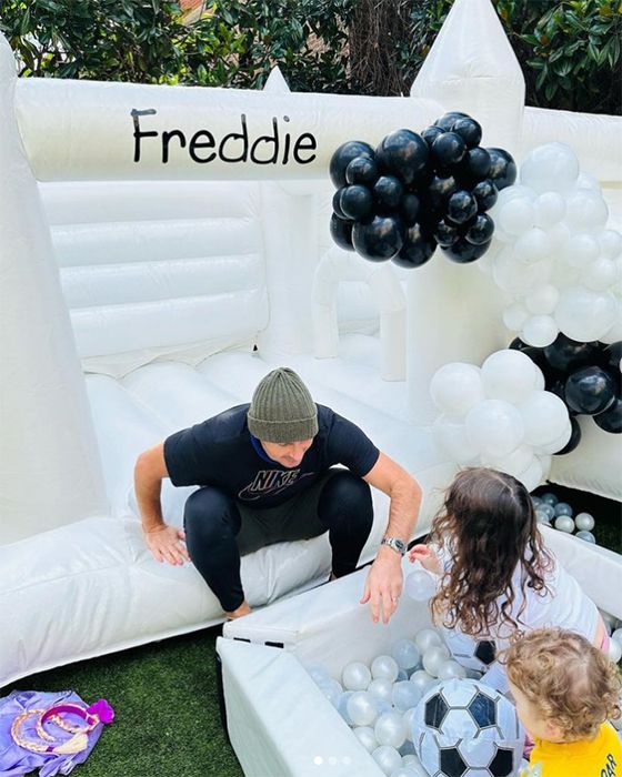 Frank Lampard with his children on bouncy castle