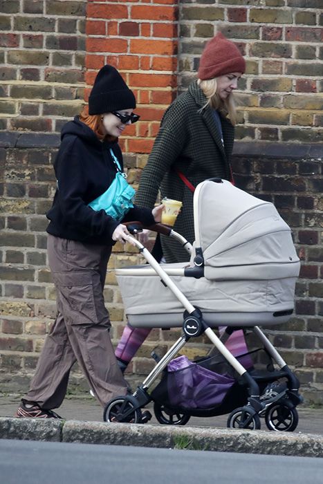 Stacey Dooley smiling at her baby daughter Minnie