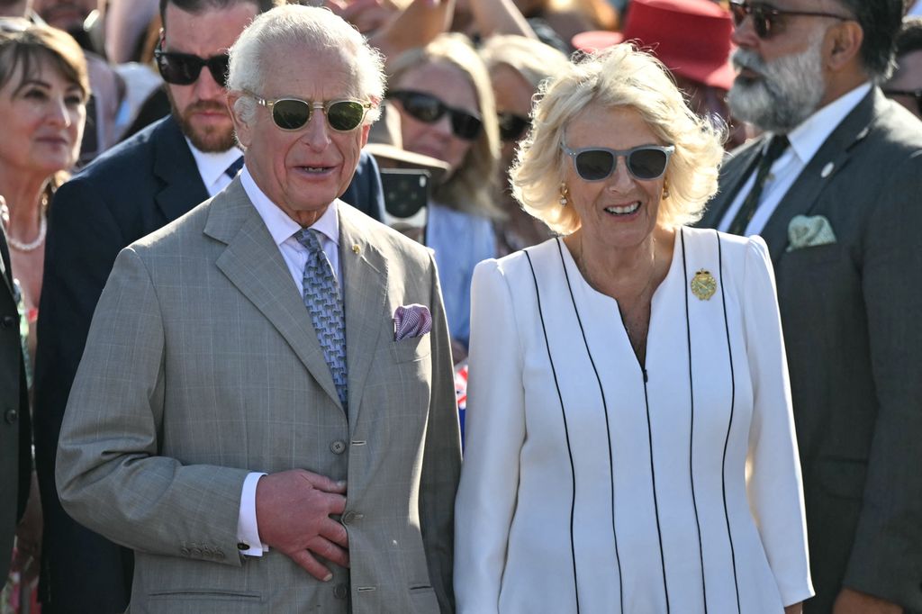 Charles and Camilla wearing sunglasses at Sydney Opera House