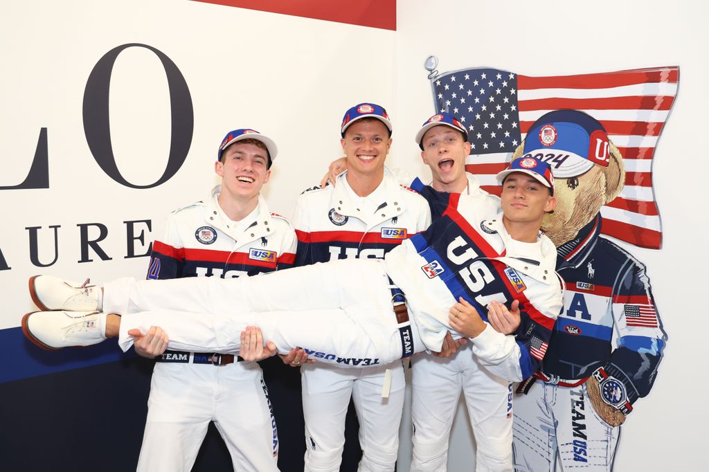 Athletes from Team US in white outfits