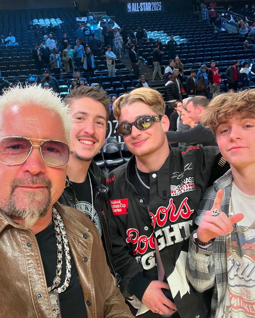 Guy Fieri with his sons Hunter and Ryder, and nephew Jules, at a basketball game, shared on Instagram