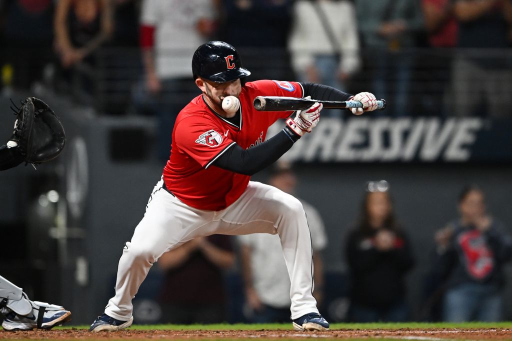 David Fry #6 of the Cleveland Guardians fouls a bunt off his face during the sixth inning against the Detroit Tigers at Progressive Field on September 23, 2025 in Cleveland, Ohio