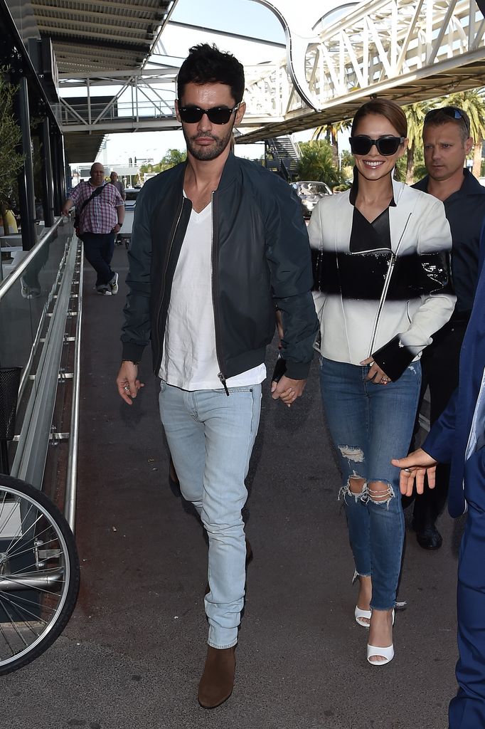 Jean-Bernard Ferandez-Versini walking hand-in hand with Cheryl Cole