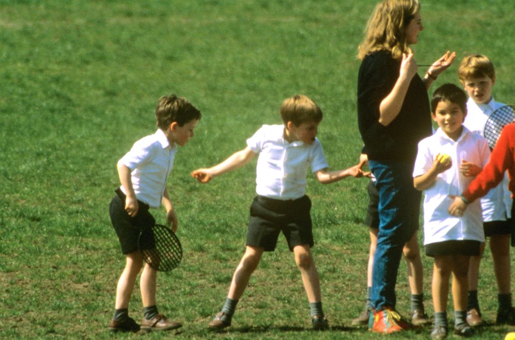 Prince William pinching teacher during school games, 1989
