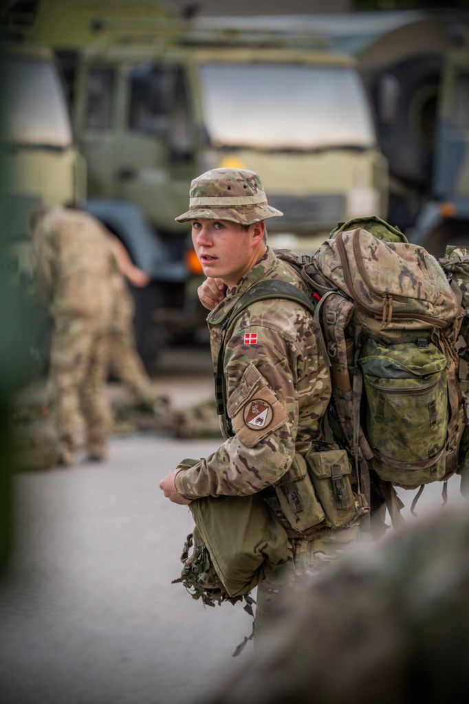 Crown Prince Christian in combat fatigues preparing for REX exercise