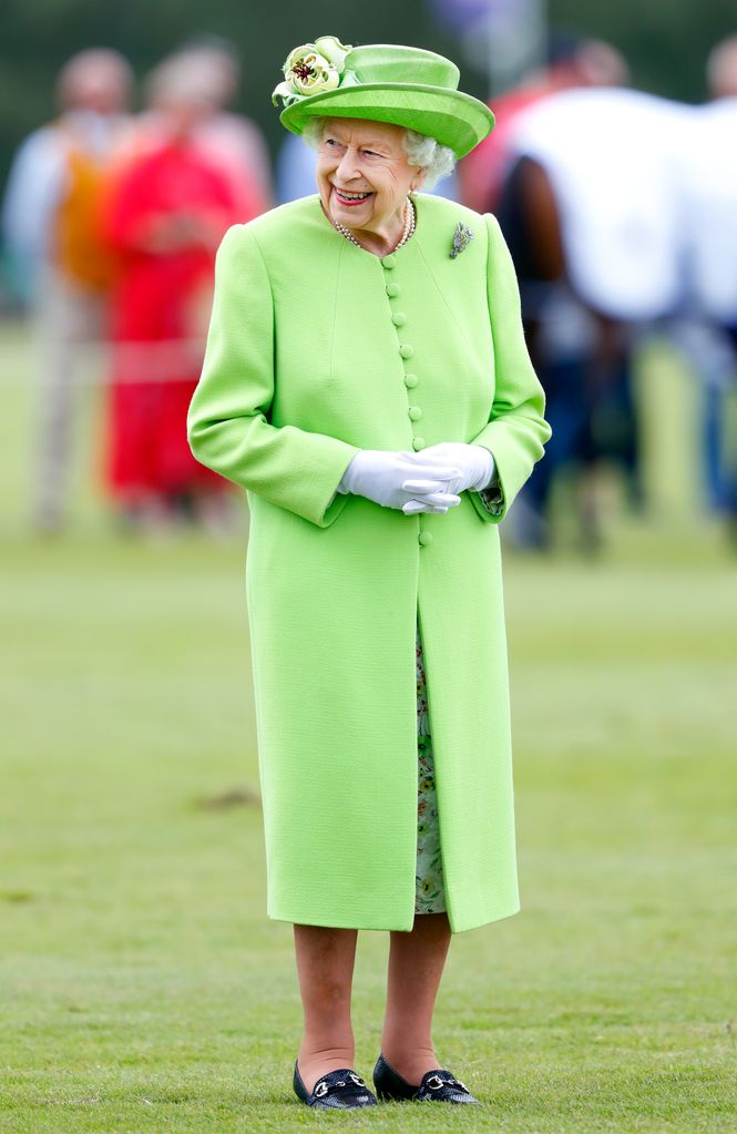 Queen Elizabeth II attends the Out-Sourcing Inc. Royal Windsor Cup polo match and a carriage driving display by the British Driving Society at Guards Polo Club, Smith's Lawn on July 11, 2021 in Egham, England. 