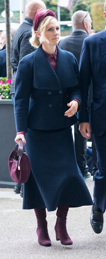 Zara Tindall in navy peplum coat and wool skirt