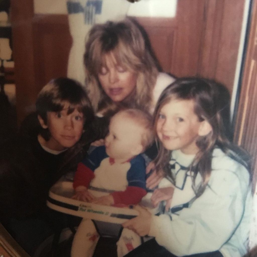 Goldie Hawn and her children Oliver Hudson, Kate Hudson, and Wyatt Russell in a childhood throwback