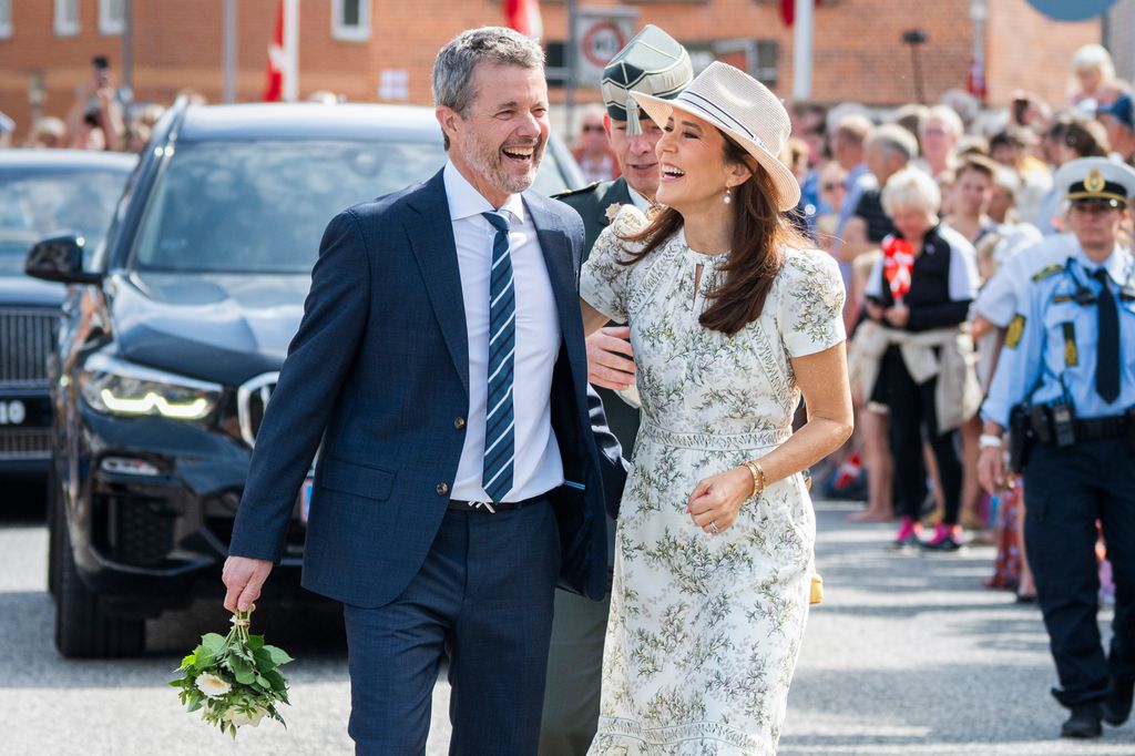 King Frederik and Queen Mary laughing together