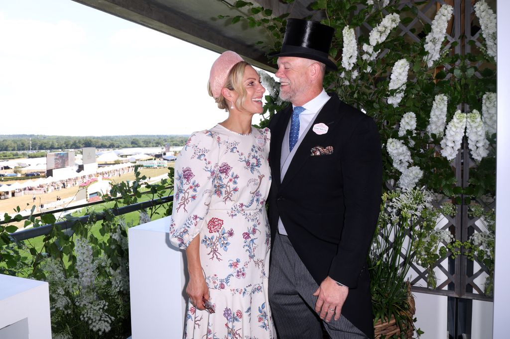 Zara and Mike Tindall smiling and looking at each other