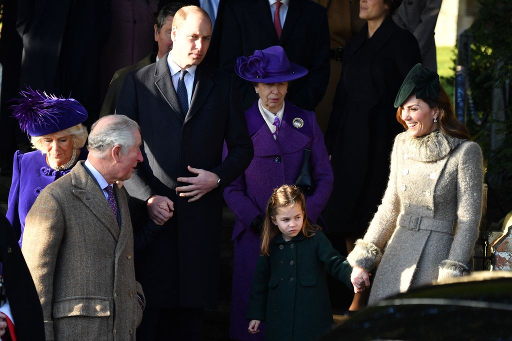 King Charles checks on Princess Charlotte by turning to talk to the nervous-looking royal