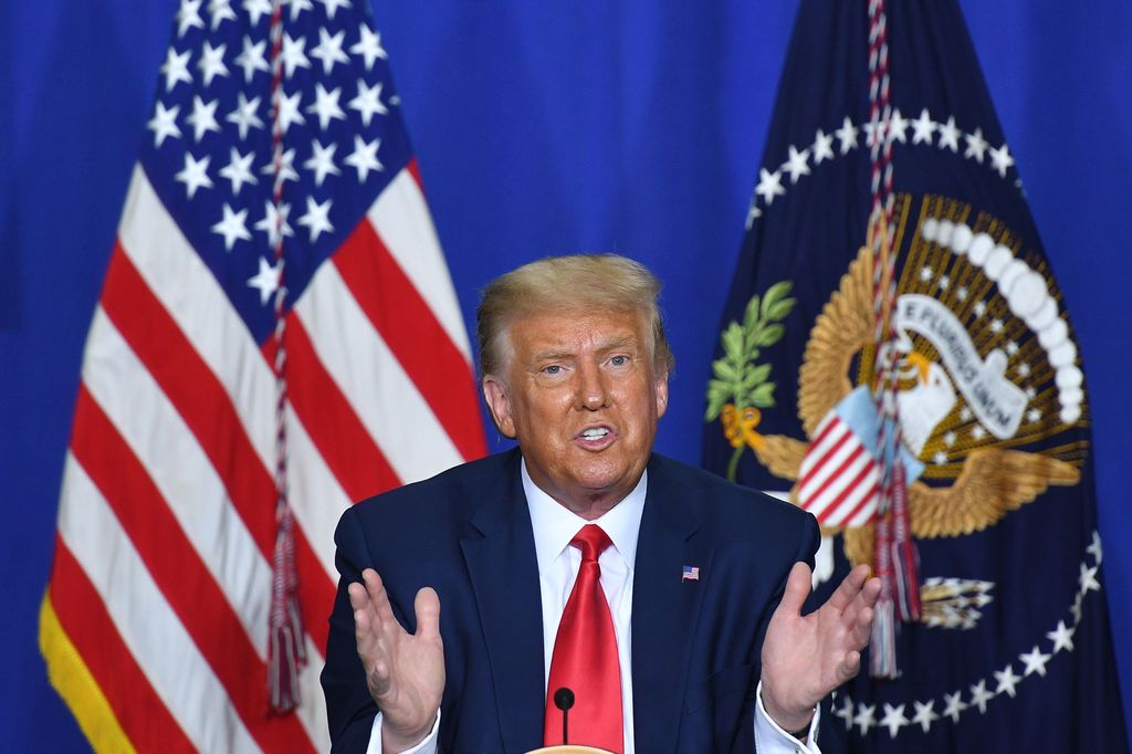 US President Donald Trump speaks to officials during a roundtable discussion on community safety