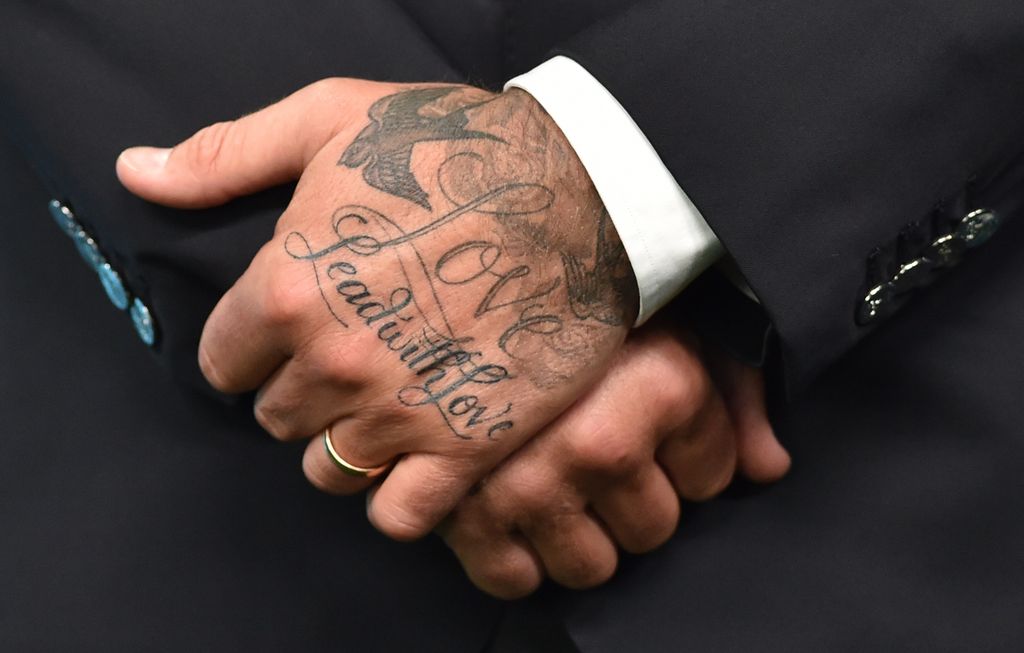 David has 'Lead with Love' scrawled across his hands