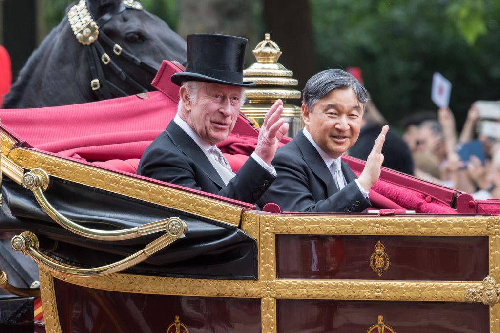 King Charles and Emperor Naruhito travel in a carriage towards Buckingham Palace after the ceremonial welcome at Horse Guards Parade
