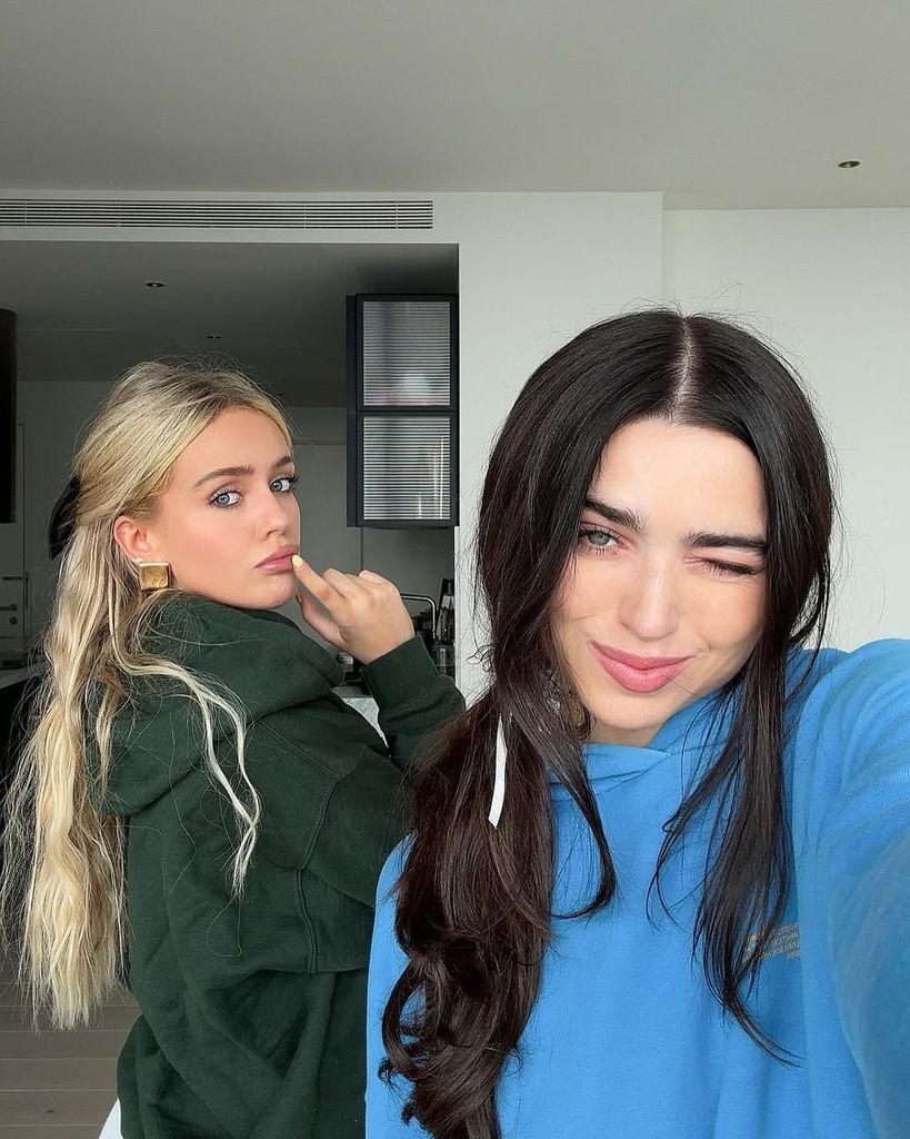 brooke and jess selfie in colourful hoodies