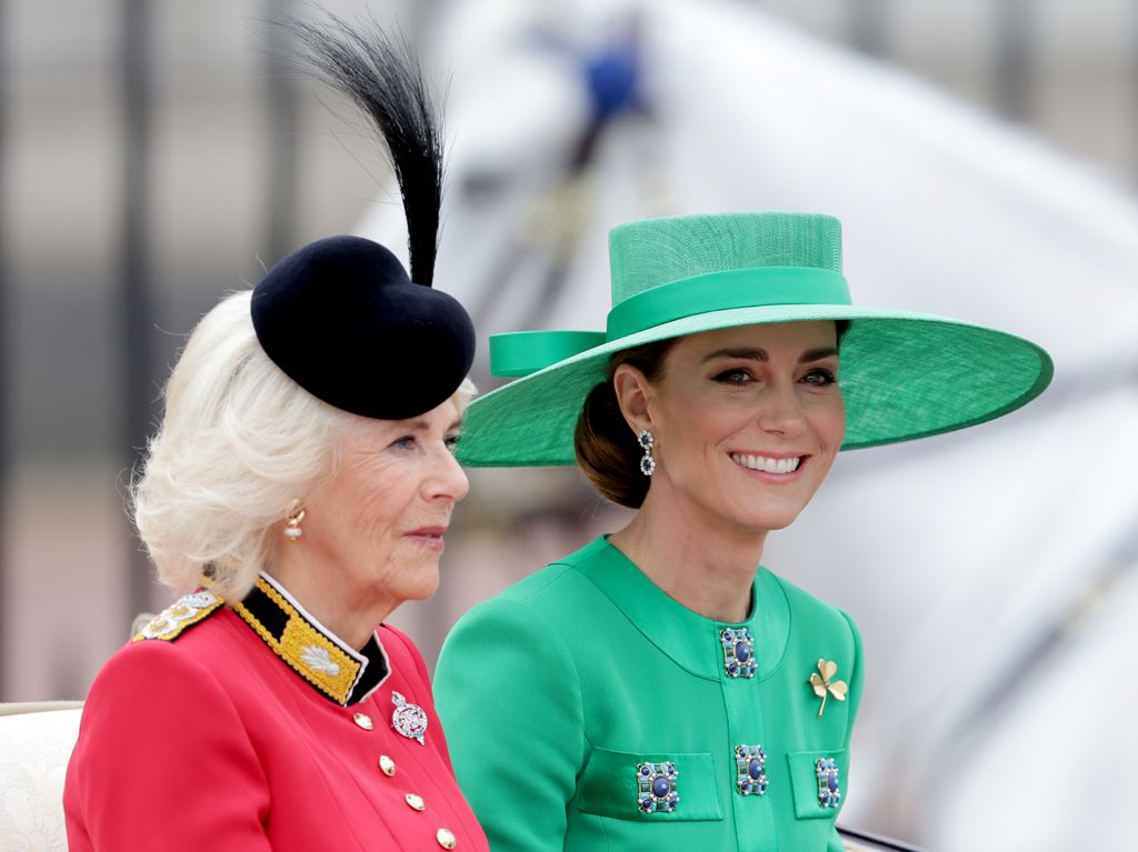 Queen Camilla and Kate Middleton, Princess of Wales travel in the royal carriage during Trooping the Colour on June 17, 2023 in London, England. 