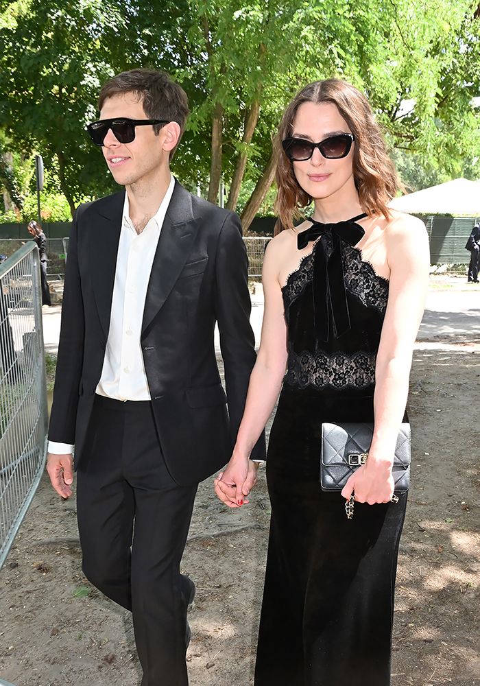 Keira Knightley and James Righton holding hands in Paris