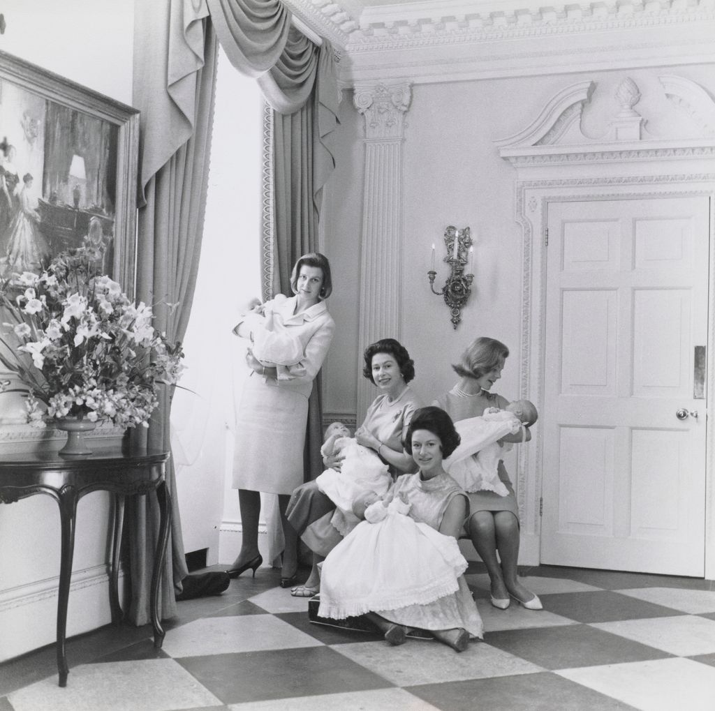 Queen Elizabeth II, Princess Margaret, Princess Alexandra and The Duchess of Kent – holding their newborn babies.