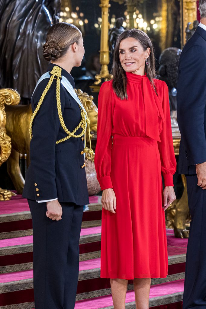 The Queen looked radiant in a striking red dress