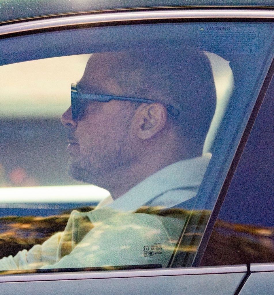 Brad Pitt was spotted with a completely shaved head while driving in L.A., looking nearly unrecognizable