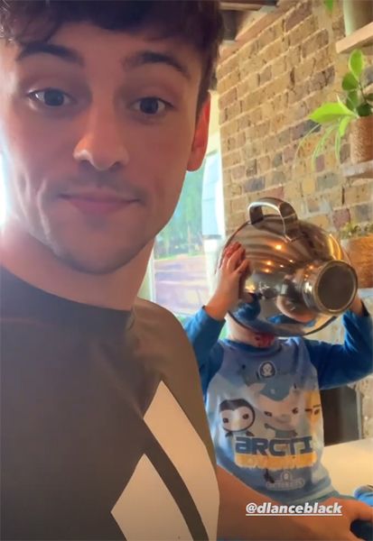 tom daley son robbie drinking mixing bowl