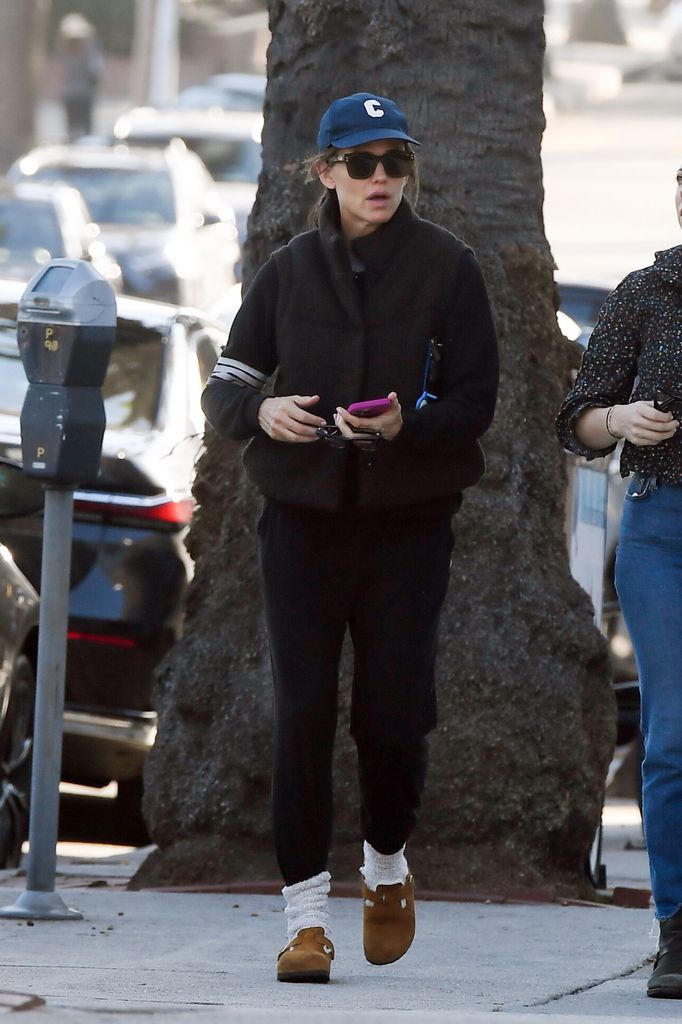 Jennifer Garner wearing Birkenstock Boston Clogs with socks