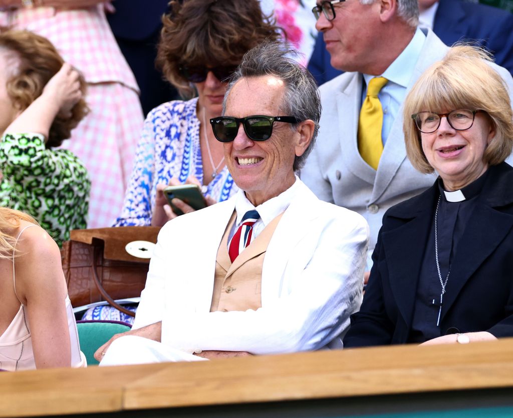Richard E Grant in the royal box at wimbledon