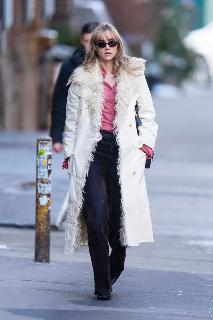 suki waterhouse in an aghan coat