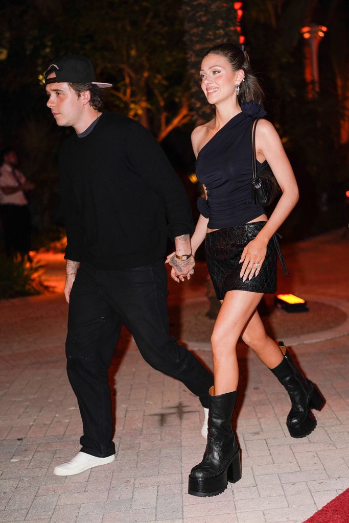 Nicola Peltz wearing a black Magda Butrym top that Sofia Richie wore on her honeymoon