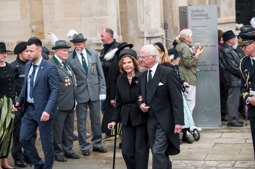 Queen Silvia of Sweden and Swedish King Carl XVI Gustaf leave the palace square after the funeral service for Prince Andreas of Saxe-Coburg and Gotha
